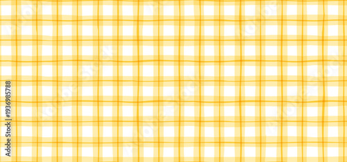 Hand-drawn yellow check pattern with a soft gingham texture. Seamless yellow and white tartan background for textile designs and decorative prints