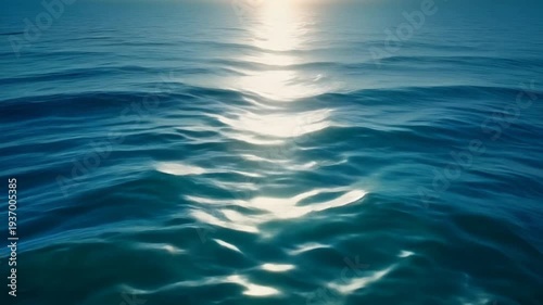 Sunlit Ocean Water Reflection Captured from Low Angle Over Serene Horizon – Peaceful Landscape Photography