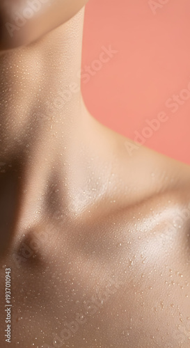 Wallpaper Mural Close up of a woman's neck and collarbone glistening with water droplets and subtle shimmer against a soft peach background Torontodigital.ca