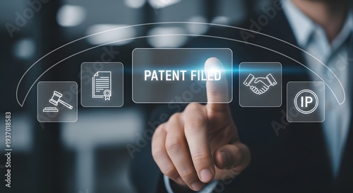 Businessman touching the screen about patent filed for business, science, and industry.