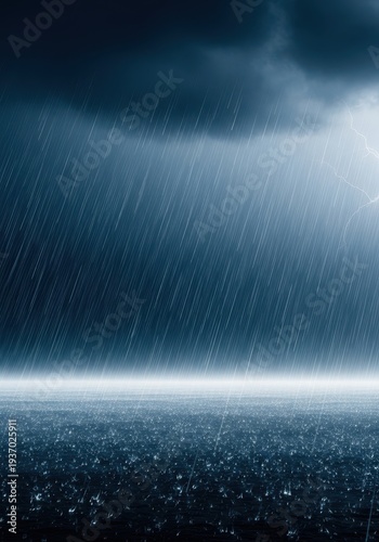 Heavy downpour sweeping across a landscape under threatening, dark, stormy skies, signaling a severe weather event approaching quickly, shower, downpour, intense