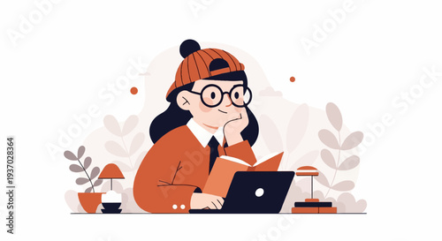 A young person with glasses and a cap reads a book and uses a laptop