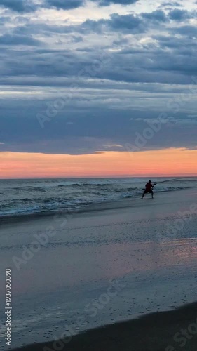 Peaceful Beach Fishing Scene at Sunset with Ocean Waves