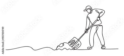 Gardener actively cultivating soil with a pitchfork, engaged in agricultural work or gardening, perfect for agricultural brochures, landscaping services advertisements, or home improvement