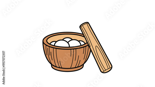 Traditional wooden mortar filled with fresh white rice cakes and a matching pestle leaning against it for making mochi in Japanese culture.
