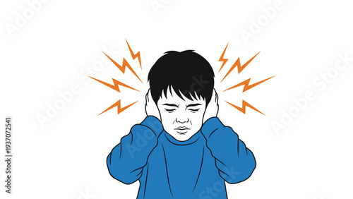 Young boy in a blue long-sleeved shirt covers his ears with a distressed expression as if experiencing a loud noise or a sharp headache.