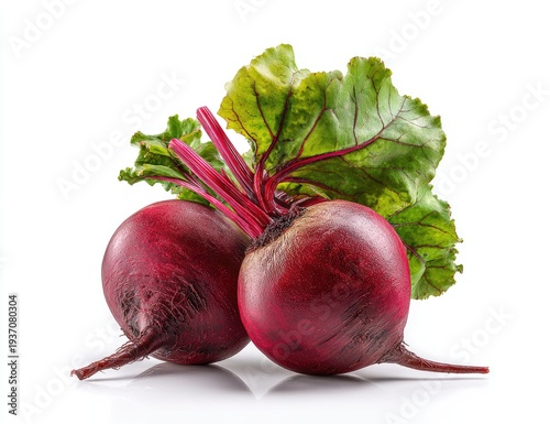 Two round red root vegetables with green leaves, isolated on white background