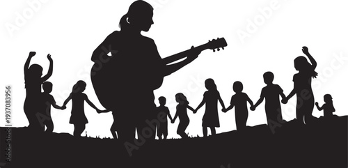 A woman plays guitar while children dance around her lively outdoors
