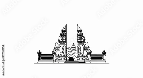 Ornate Balinese temple gate with tiered roofs and decorative elements