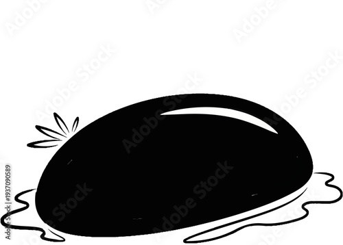 A glossy, black, abstract shape with a white highlight sits on a splash