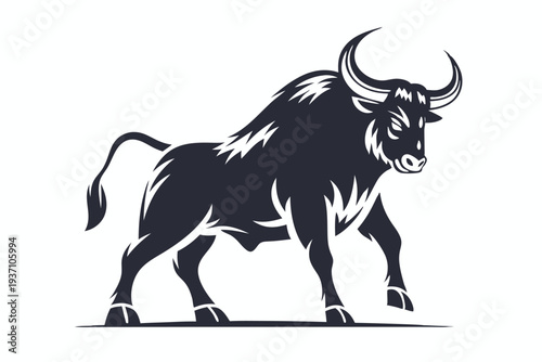 The muscular bull with sharp horns is standing in a strong pose