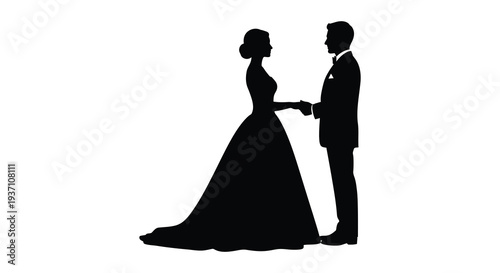 Silhouetted couple holding hands a bride in a gown and groom in a suit facing each other