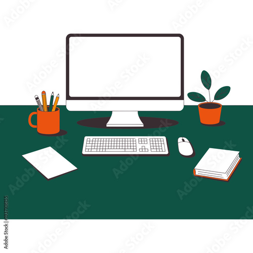 A computer monitor and office supplies on a green desk workspace