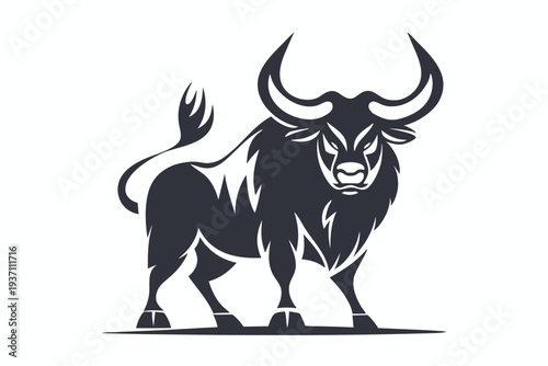 Silhouette of a powerful bull standing confidently in the grass field evokes strength and dominance