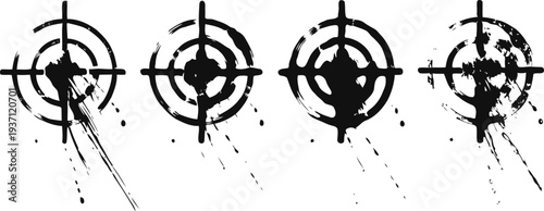 Set of four black grunge target symbols with splattered paint and scratched effects