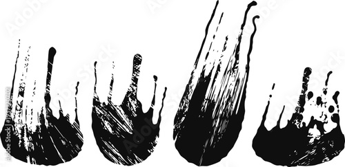 set of four black paint splashes with irregular brush strokes isolated on white background