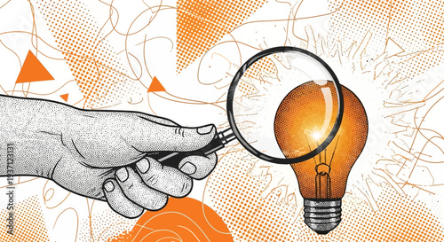 Hand holding magnifying glass over glowing light bulb.