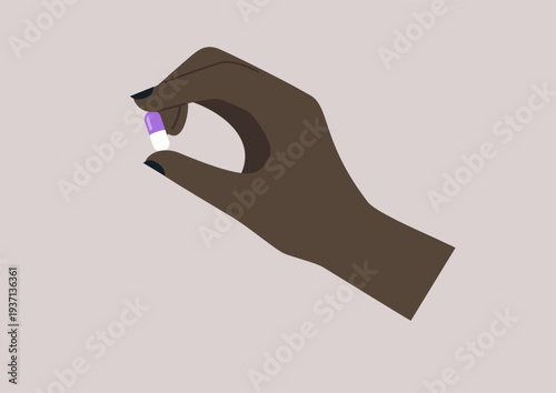 A hand delicately grips a medicine capsule, symbolizing a moment of focus on health and wellbeing, the soft background highlights the action in a serene manner.