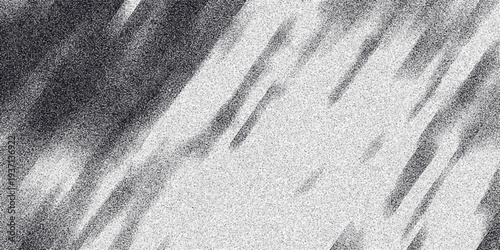Dynamic monochrome abstract background with diagonal streaks and a grainy texture, evoking a sense of motion, rain, or abstract brushstrokes against a speckled backdrop