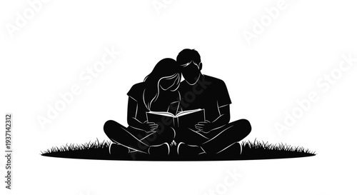 Couple reading together in a field a striking black silhouette