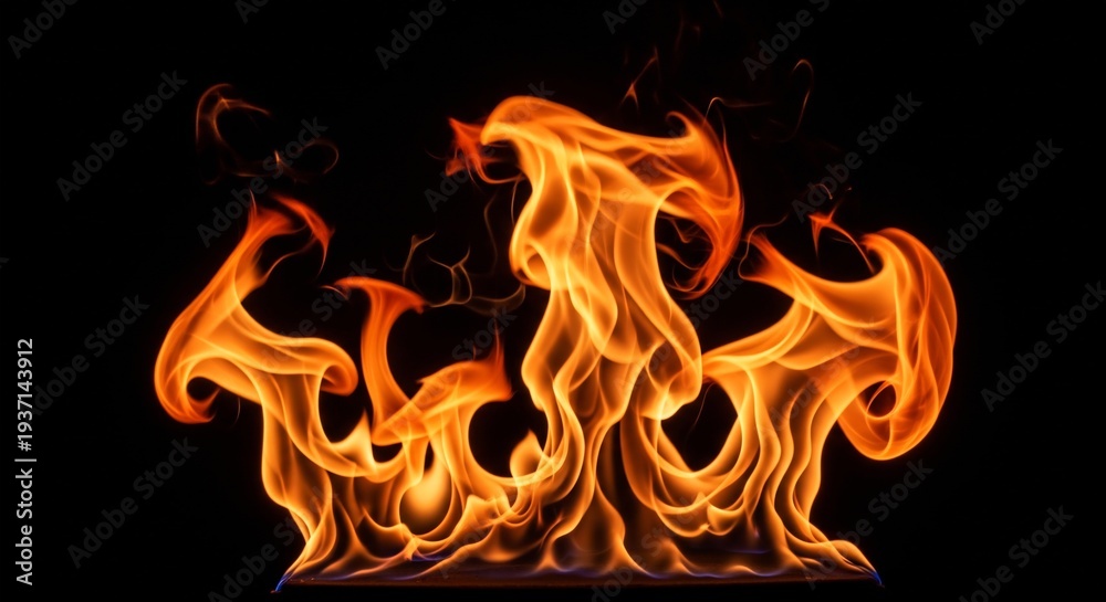 Fototapeta premium Vibrant orange flames burning against a dark background