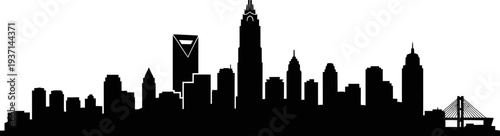 silhouette of a city skyline with skyscrapers and a bridge