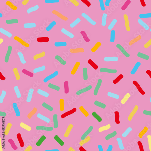 Multicolored sprinkles on pink icing seamless vector pattern. A fun print for holidays and bakeries. Cute abstract donut icing endless background.