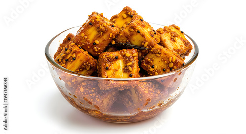 Wallpaper Mural A bowl of delicious and spicy fried paneer cubes on a white background Torontodigital.ca