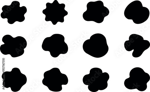 A collection of 12 black inkblots on a white background