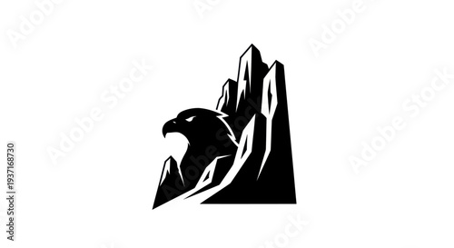Eagle perched on mountain crest silhouette