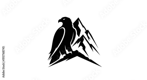 Eagle perched on mountain crest silhouette
