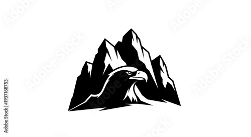 Eagle perched on mountain crest silhouette