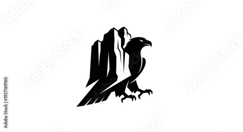 Eagle perched on mountain peak symbol