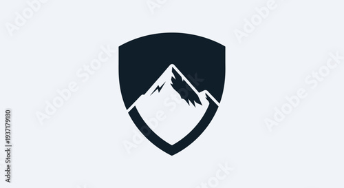 Mountain crest logo inside shield emblem, adventure and protection symbol