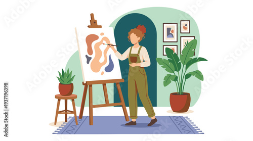 Creative woman painting abstract art on canvas in modern home studio