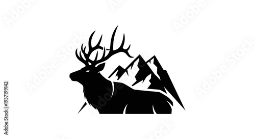 Silhouette elk and mountain peaks