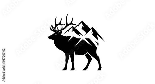 Silhouette of a majestic elk with mountain peaks