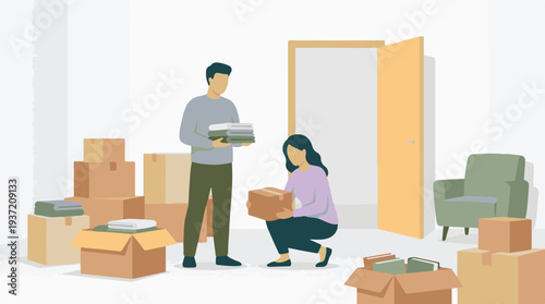 Couple packing and moving belongings into a new home or apartment
