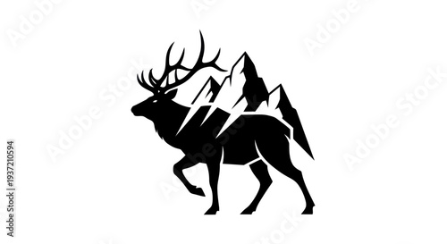 Silhouette of elk and mountain peaks