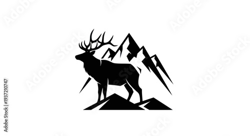Silhouette of elk and mountain peaks