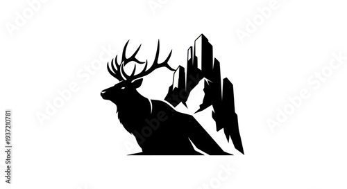 Silhouette of elk and mountain peaks