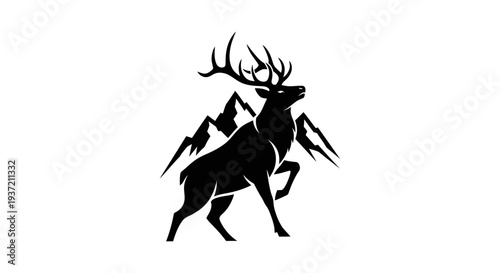 Silhouette of stag with mountain background