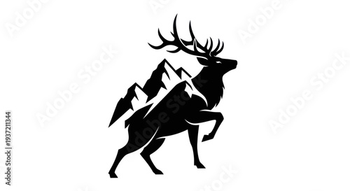 Silhouette of stag with mountain peaks