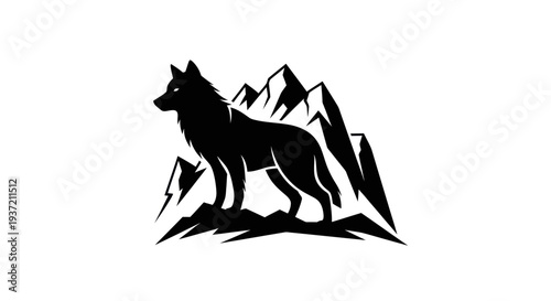 Silhouette of wolf and mountain peaks
