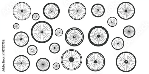 Assortment of bicycle wheels of various sizes and spoke patterns on a white background Keywords: bicycle, wheel, bike, cycle