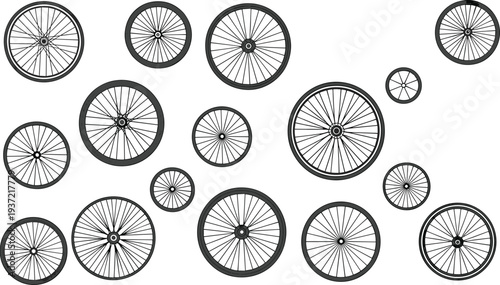Assortment of bicycle wheels of various sizes on a white background bike wheel spokes