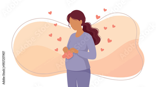 Pregnant woman holding baby booties, anticipating motherhood with love
