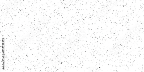 Subtle monochrome speckled pattern with irregular grey and white mosaic-like elements creating a textured abstract background for design and decoration