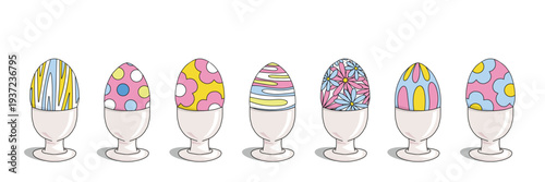 Decorative Easter Eggs sit on white egg stands. Each egg illustration features a unique pattern with stripes, polka dots, waves and floral motifs and pastel color scheme. Isolated vector elements