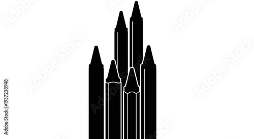 Collection of black colored pencils standing upright in a row creating a sharp pointed silhouette against a stark white